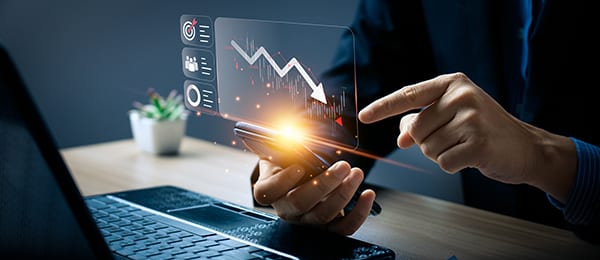 Economic collapse concept, businessman with falling financial graph chart due to global recession. Stock market crash, inflation, financial crisis, Falling income in GDP, capital reduction